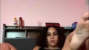 horny latina shakes ass with dildo on bed