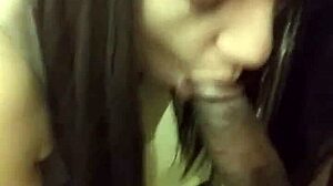 bbc lover brunette slurps massive throbbing big black monster cock