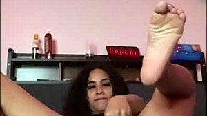 horny latina shakes ass with dildo on bed