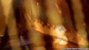 Isn't this teasing Indian brunette's striptease dance arousing you?