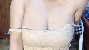 Behind those glasses, the young Vietnamese girl spreads wide for intense solo play on cam.