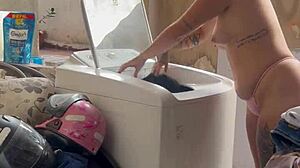 neighbor hides watching woman wash clothes freely with pussy and tits out in public outdoor spot