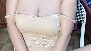 Behind those glasses, the young Vietnamese girl spreads wide for intense solo play on cam.