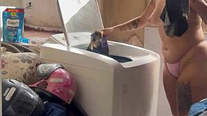 neighbor hides watching woman wash clothes freely with pussy and tits out in public outdoor spot