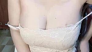 Behind those glasses, the young Vietnamese girl spreads wide for intense solo play on cam.