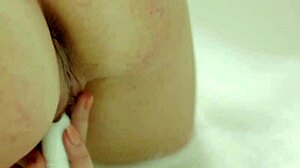 antoinette dives deep with dildo in steamy bath underwater