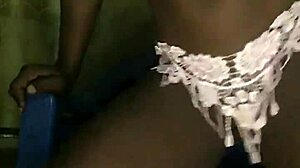 Stripping seductively in panties and bra tease