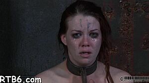 her tight cunt strains against the leather bonds begging for rough taming