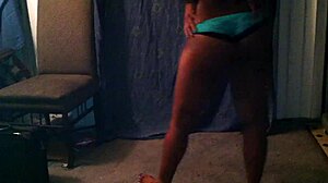 skinny black chick dances seductively