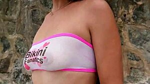 sexy petite brunette babe flashes bikini at public beach photoshoot