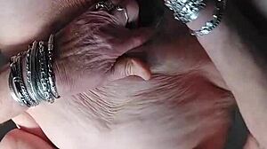 granny stuffs dildo and cucumber into hairy pussy