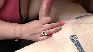 Milfy mama milks uncut cock on fat lactating tits