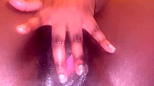 Dripping creamy black pussy lips spread wide for fingering fun