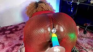 african bunz stuffs dildo up tight asshole in red skirt pov.