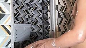 Beautiful housewife dances seductively before muscular stud's cum in mouth bathroom pounding