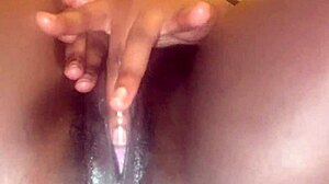 Dripping creamy black pussy lips spread wide for fingering fun