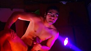 muscular studs stroke monster cocks in purple orange shadows handjob