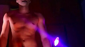muscular studs stroke monster cocks in purple orange shadows handjob