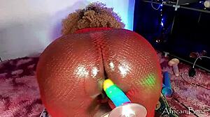 african bunz stuffs dildo up tight asshole in red skirt pov.