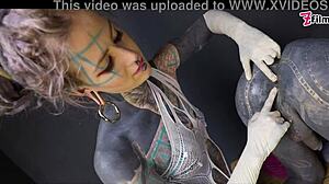 Tattooed dominatrix fists tranny ass gaping wide
