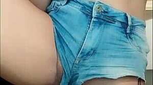Hey check out this hot tattooed fitness babe showing off her big tits and ass in jeans