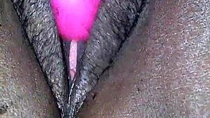 Miss Chocolate's fat ebony ass squirts on dildo