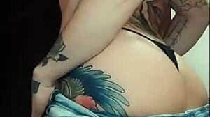 Hey check out this hot tattooed fitness babe showing off her big tits and ass in jeans
