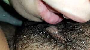 Lesbian Couple's Close-Up Lick Fest on Hairy Wet Pussy and Clit