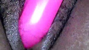 Miss Chocolate's fat ebony ass squirts on dildo