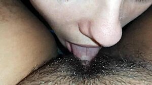 Lesbian Couple's Close-Up Lick Fest on Hairy Wet Pussy and Clit
