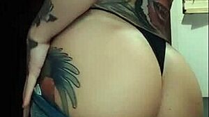 Hey check out this hot tattooed fitness babe showing off her big tits and ass in jeans