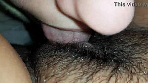 Lesbian Couple's Close-Up Lick Fest on Hairy Wet Pussy and Clit