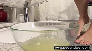 omg this cute chick totally pees into giant glass balloon