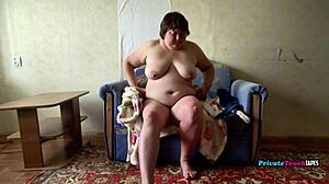 Russian chubby milf wife fingers her fat pussy in homemade lingerie