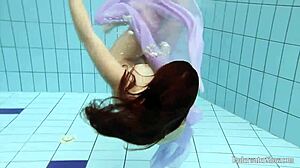 blackhaired teen aneta strips nude by the pool