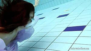 blackhaired teen aneta strips nude by the pool