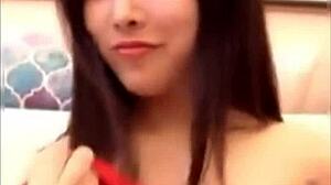 hey check out this beautiful chinese babe flashing her cute boobs