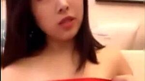 hey check out this beautiful chinese babe flashing her cute boobs