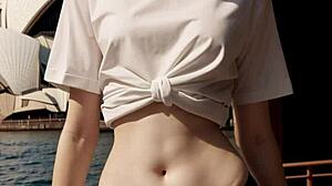 A cute australian model struts her lingerie look right at the sydney opera house