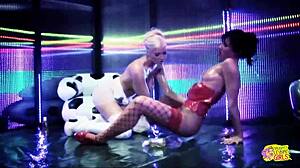 a couple of latex-clad sex bombs oil up and strap-on bang hard