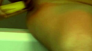 Horny redhead slut fucks juicy pussy with thick banana