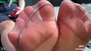goddess teases her cute nylon soles and toes riverside in tan pantyhose 😍👣🌊 close-up foot fetish fun