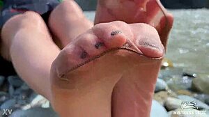 goddess teases her cute nylon soles and toes riverside in tan pantyhose 😍👣🌊 close-up foot fetish fun