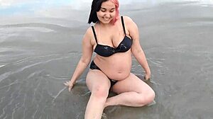 pregnant african teen belinha sensually poses belly on beach