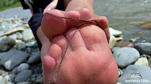 goddess teases her cute nylon soles and toes riverside in tan pantyhose 😍👣🌊 close-up foot fetish fun