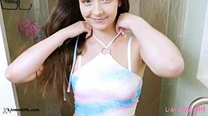 striking brunette beauty strips down and takes a steamy shower