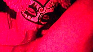 Masked Redhead Sucks Cock in Red Light Homemade
