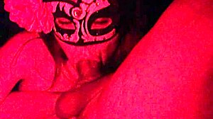 Masked Redhead Sucks Cock in Red Light Homemade