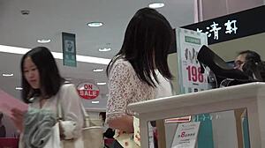 Two short skirt meaty nylon beauties try on high heels in shoe store hidden cam