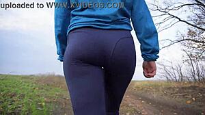 milf's tight pants hug her perfect ass from behind view